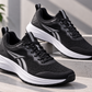Black men's gym and running shoes with white cushioned sole